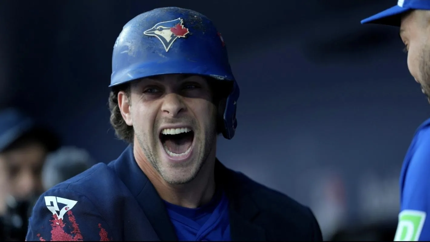 Toronto Blue Jays third baseman Ernie Clement (22) celebrates after hitting a home run in the second inning against the New York Yankees during game two of the ALDS round for the 2025 MLB playoffs at Rogers Centre.