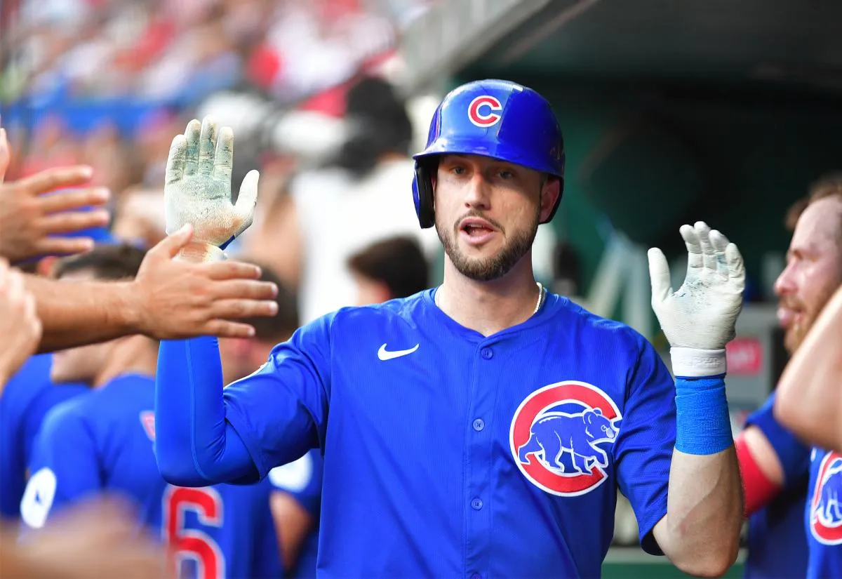 Chicago Cubs outfielder Kyle Tucker (30) celebrates his home run against the St. Louis Cardinals in the third inning at Busch Stadium with teammates in the dugout.