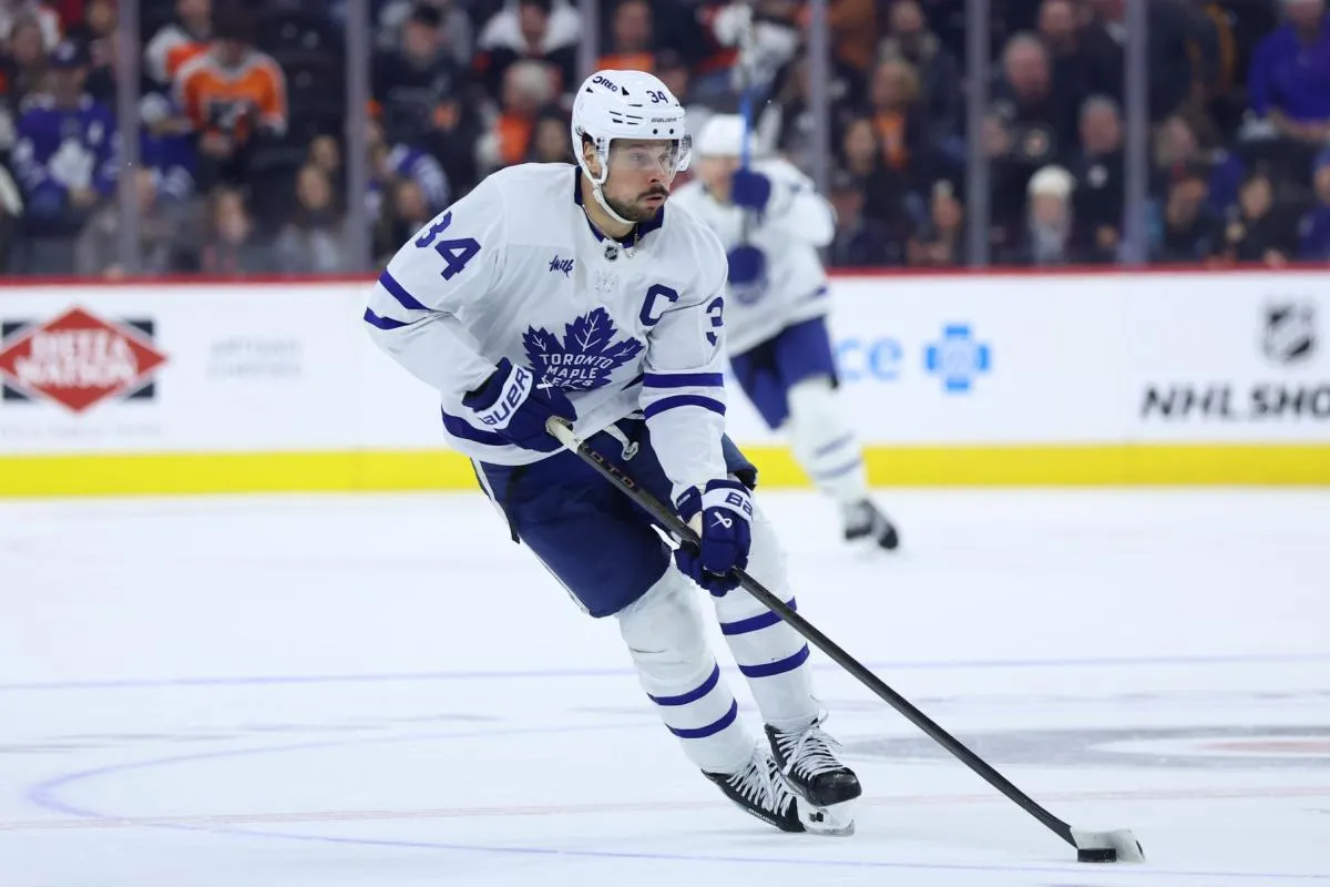 Toronto Maple Leafs center Auston Matthews (34) skates with the puck against the Philadelphia Flyers during overtime at Xfinity Mobile Arena.