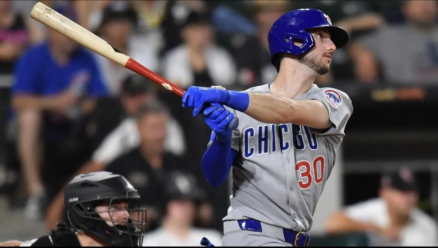 Chicago Cubs right fielder Kyle Tucker (30) hits a single during the ninth inning against the Chicago White Sox at Rate Field.