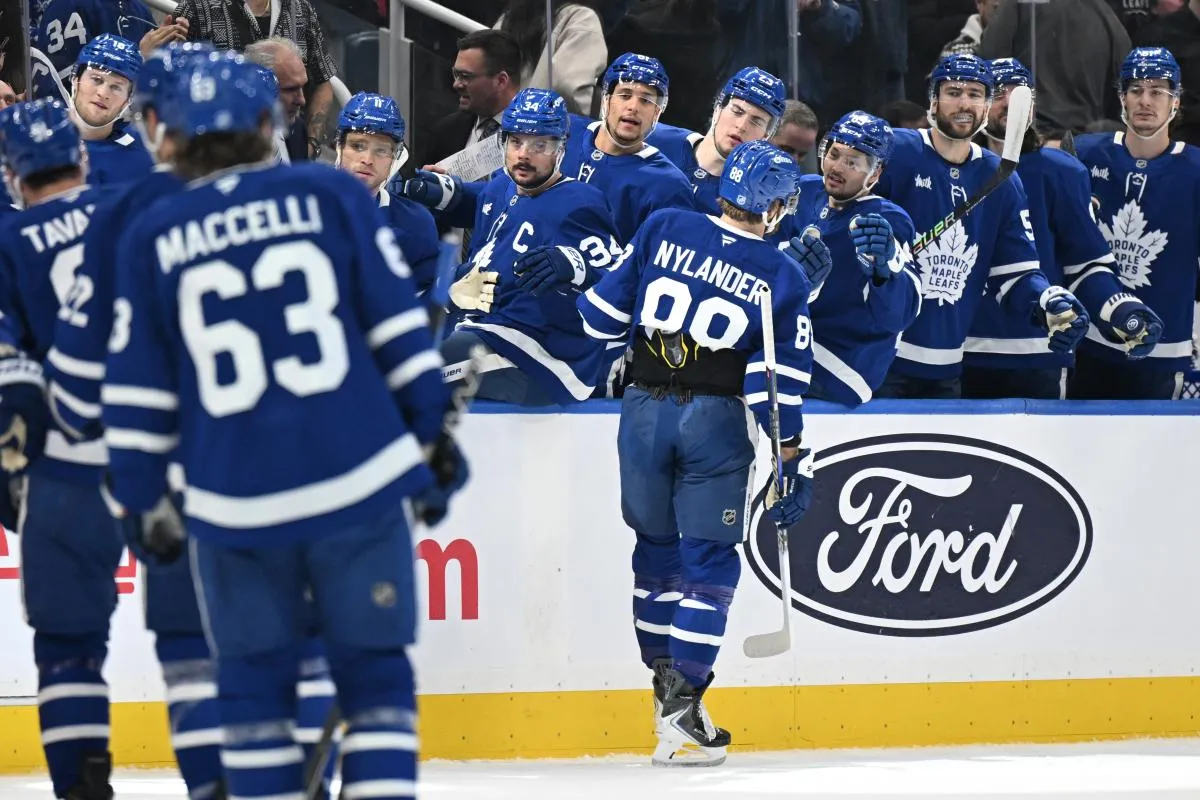 Toronto Maple Leafs forward William Nylander (88) celebrates with team mates at the bench after scoring a goal against the Pittsburgh Penguins in the first period at Scotiabank Arena.
