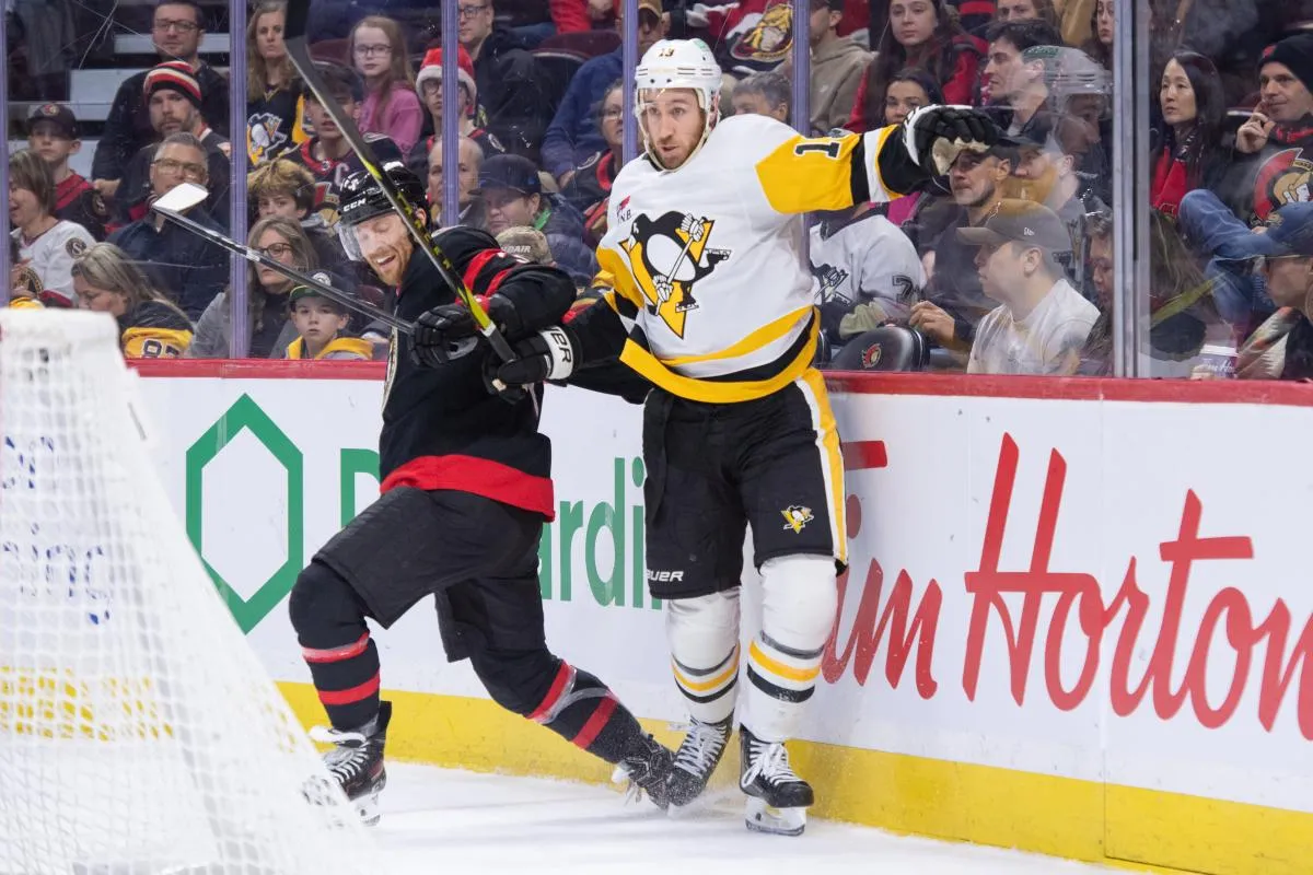 Ottawa Senators defenseman Nick Jensen (3) and Pittsburgh Penguins right wing Kevin Hayes (13) battle in the second period at the Canadian Tire Centre.