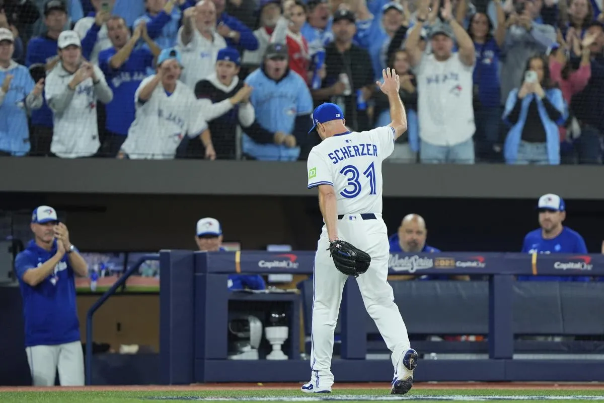Toronto Blue Jays pitcher Max Scherzer (31) is relieved in the fifth inning against the Los Angeles Dodgers during game seven of the 2025 MLB World Series at Rogers Centre.