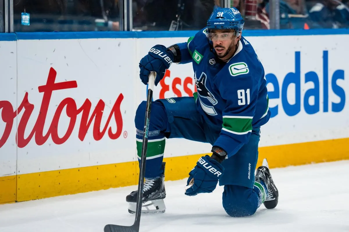 Vancouver Canucks forward Evander Kane (91) gets up after a check against the Seattle Kraken in the second period at Rogers Arena.
