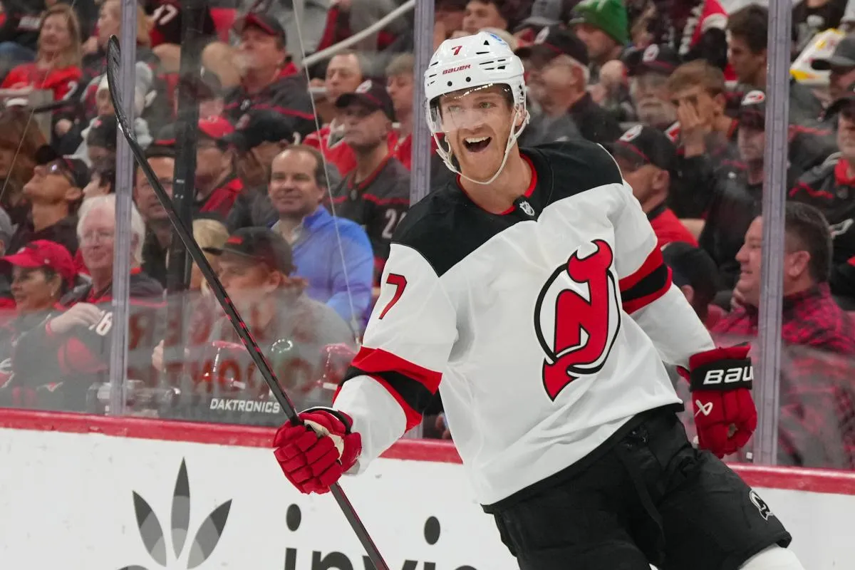 New Jersey Devils defenseman Dougie Hamilton (7) celebrates his goal against the Carolina Hurricanes during the second period at Lenovo Center.