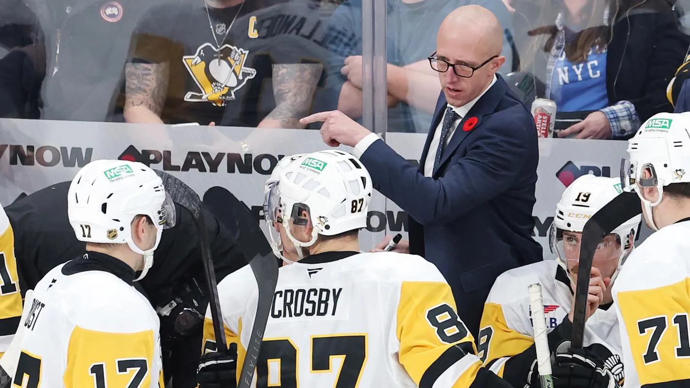 Pittsburgh Penguins head coach Dan Muse instructs players during a time out against the Winnipeg Jets in the third period at Canada Life Centre.