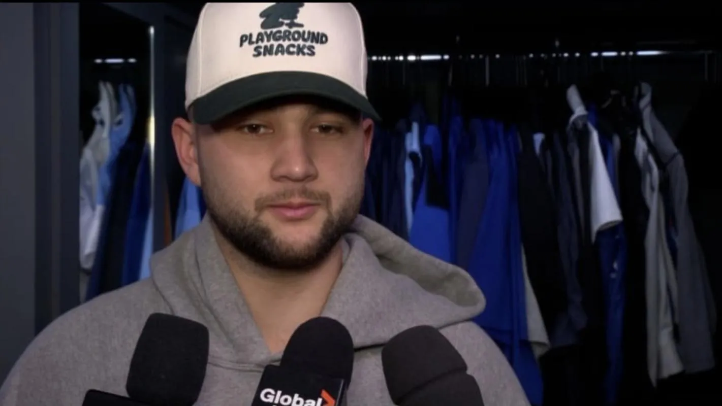 Toronto Blue Jays designated hitter Bo Bichette (11) doing an interview with the media in the clubhouse after losing game seven of the 2025 MLB World Series to the Los Angeles Dodgers at Rogers Centre.