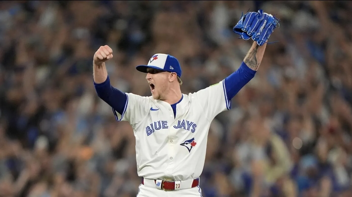 Toronto Blue Jays pitcher Jeff Hoffman (23) celebrates after defeating the Seattle Mariners in game seven of the ALCS round for the 2025 MLB playoffs at Rogers Centre.
