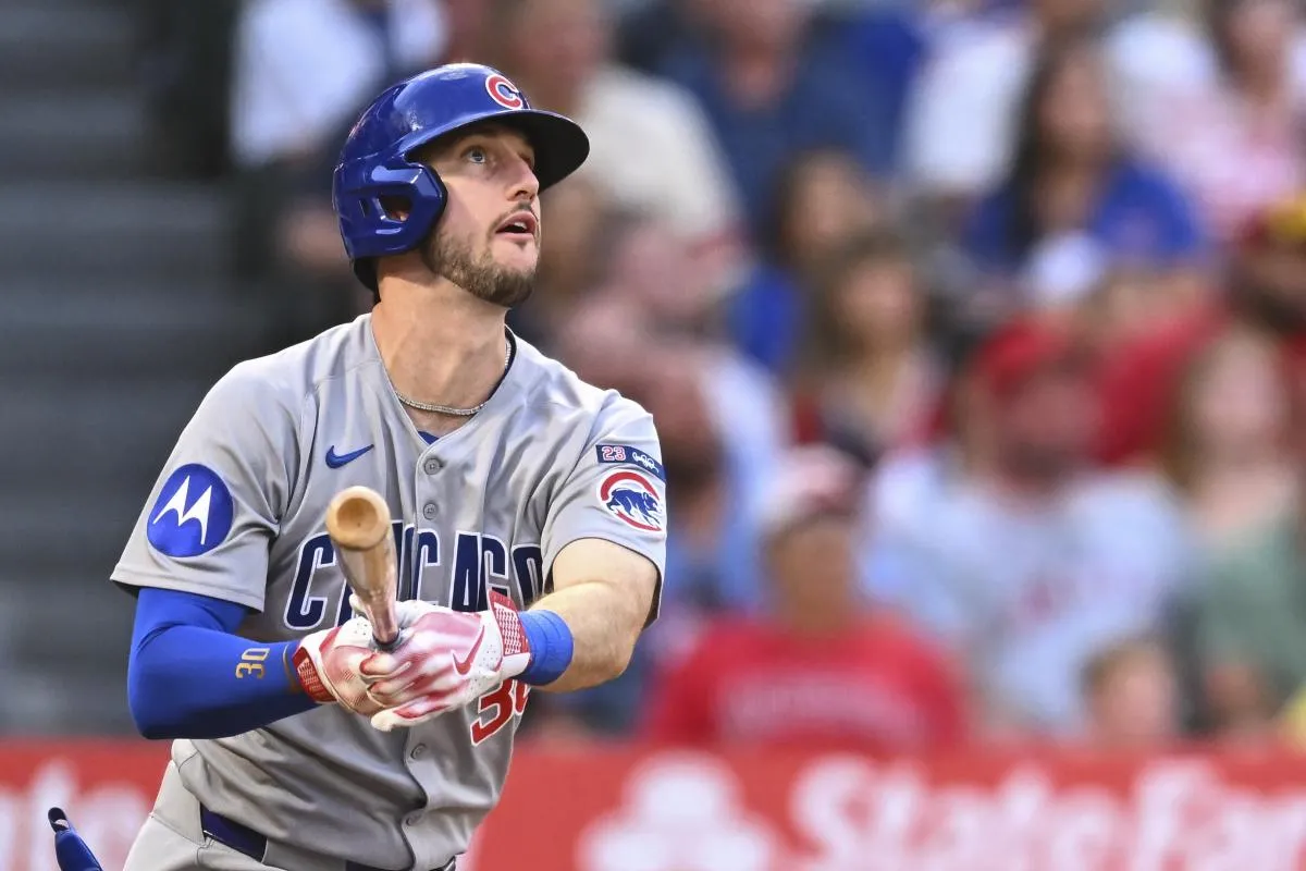 Chicago Cubs outfielder Kyle Tucker (30) hits a two-run home run against the Los Angeles Angels during the third inning at Angel Stadium.