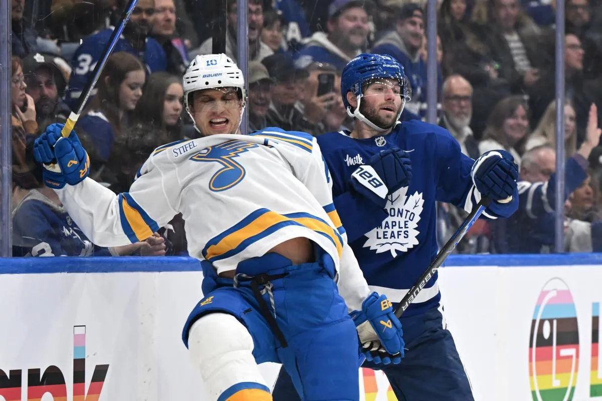St. Louis Blues forward Brayden Schenn (10) loses his balance after colliding with Toronto Maple Leafs foward Calle Jarnkrok (19) in the third period at Scotiabank Arena.