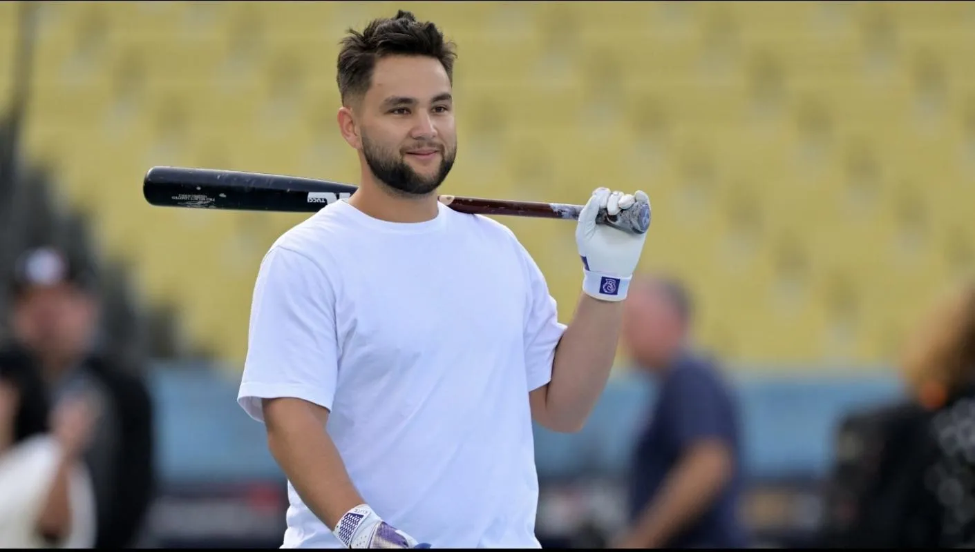 Toronto Blue Jays shortstop Bo BIchette (11) takes batting practice during World Series workouts prior to game three against the Los Angeles Dodgers at Dodger Stadium.