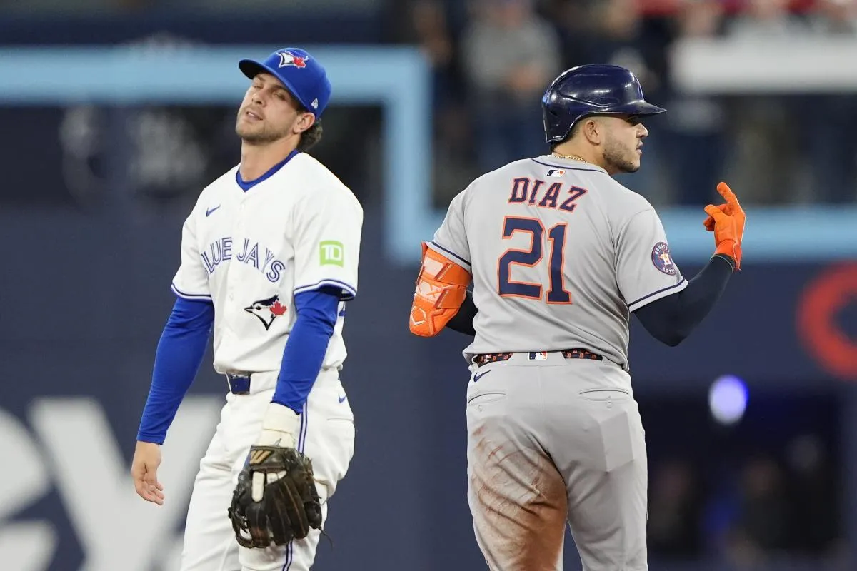Toronto Blue Jays shortstop Ernie Clement (22) reacts after a one run double by Houston Astros catcher Yainer Diaz (21) during the second inning at Rogers Centre.