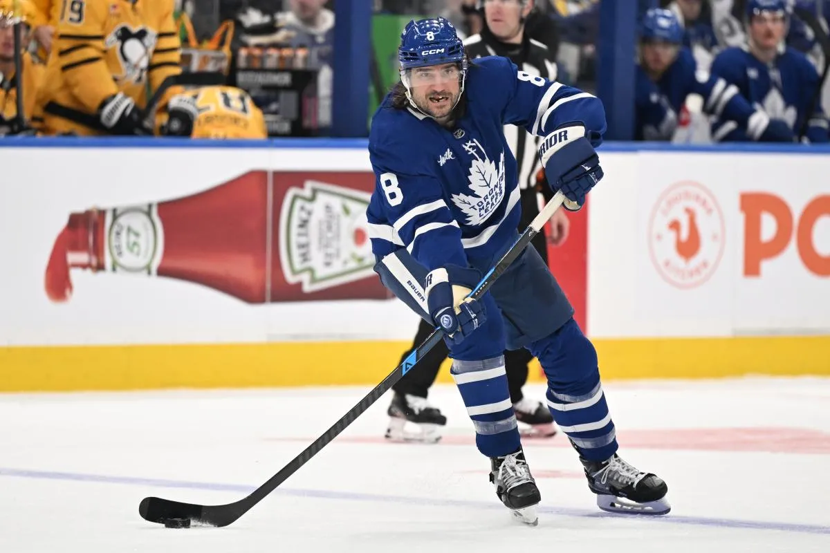 Toronto Maple Leafs defenseman Chris Tanev (8) passes the puck against the Pittsburgh Penguins in the third period at Scotiabank Arena.
