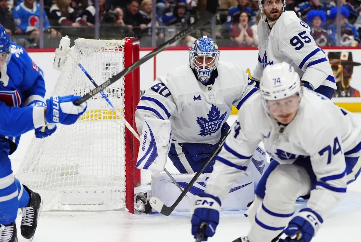 Toronto Maple Leafs goaltender Joseph Woll (60) defends the net in a overtime period against the Colorado Avalanche at Ball Arena.