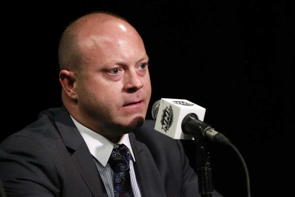 Chicago Blackhawks general manager Stan Bowman talks with media during media day the day before the 2015 Stanley Cup Final at Amalie Arena.