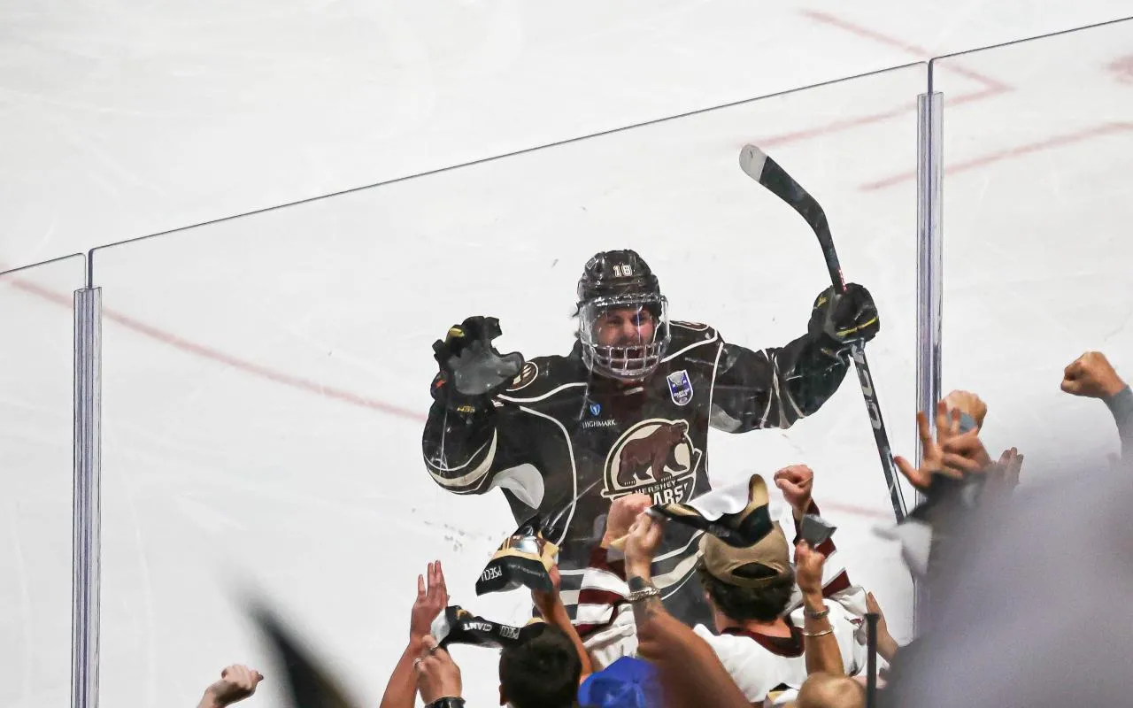 Pierrick Dube (18) celebrates with the fans after scoring a goal to tie the game at 1-1. The Hershey Bears hosted the Coachella Valley Firebirds Game 6 of the Calder Cup Finals at Giant Center on Monday June 24, 2024. The Bears defeated the Firebirds, 5-4 in OT to claim their 13th Calder Cup Championship and their second in a row.