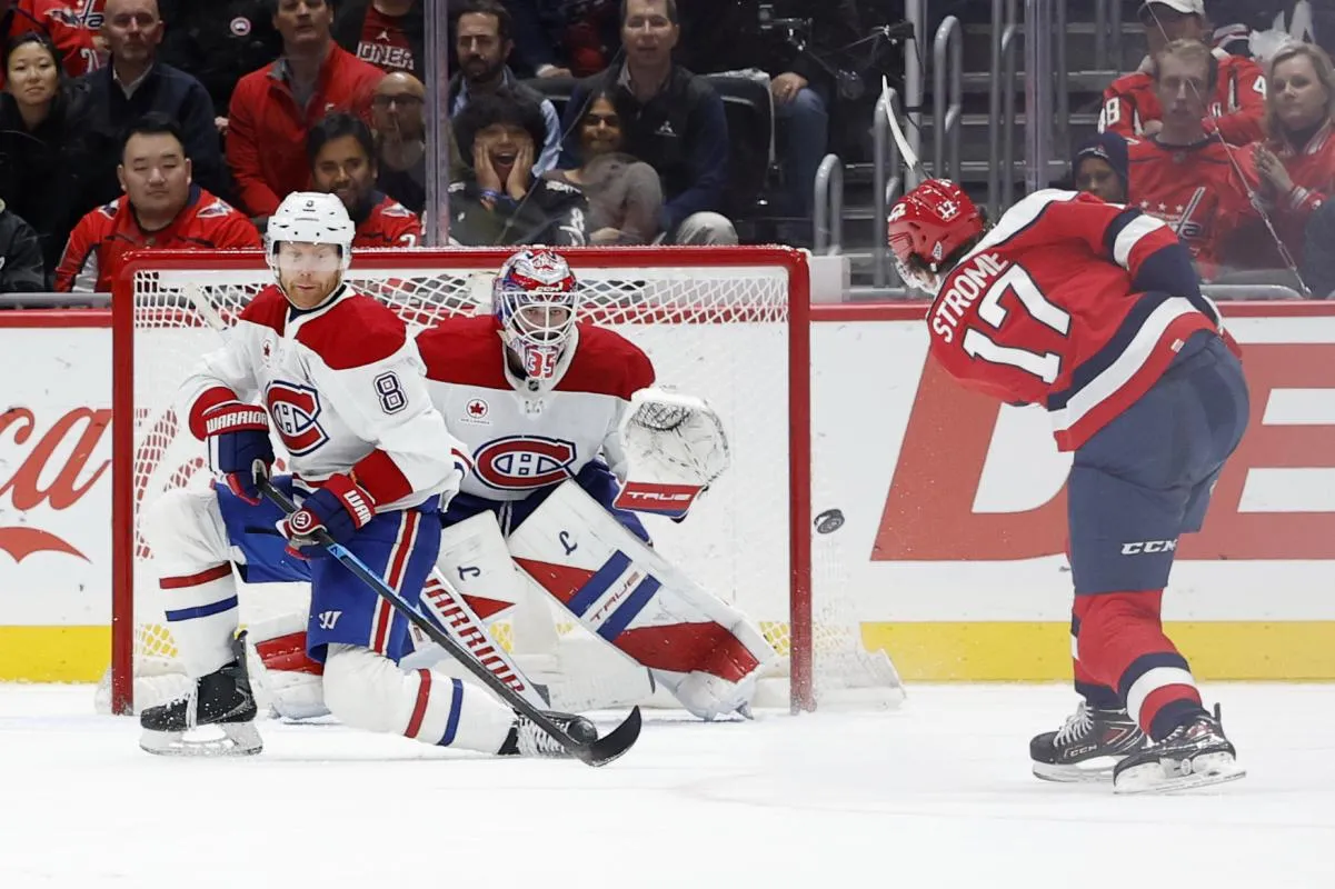 le centre des Capitals de Washington, Dylan Strome (17), tire sur le gardien des Canadiens de Montr&eacute;al, Samuel Montembeault (35), en prolongation, au Capital One Arena.