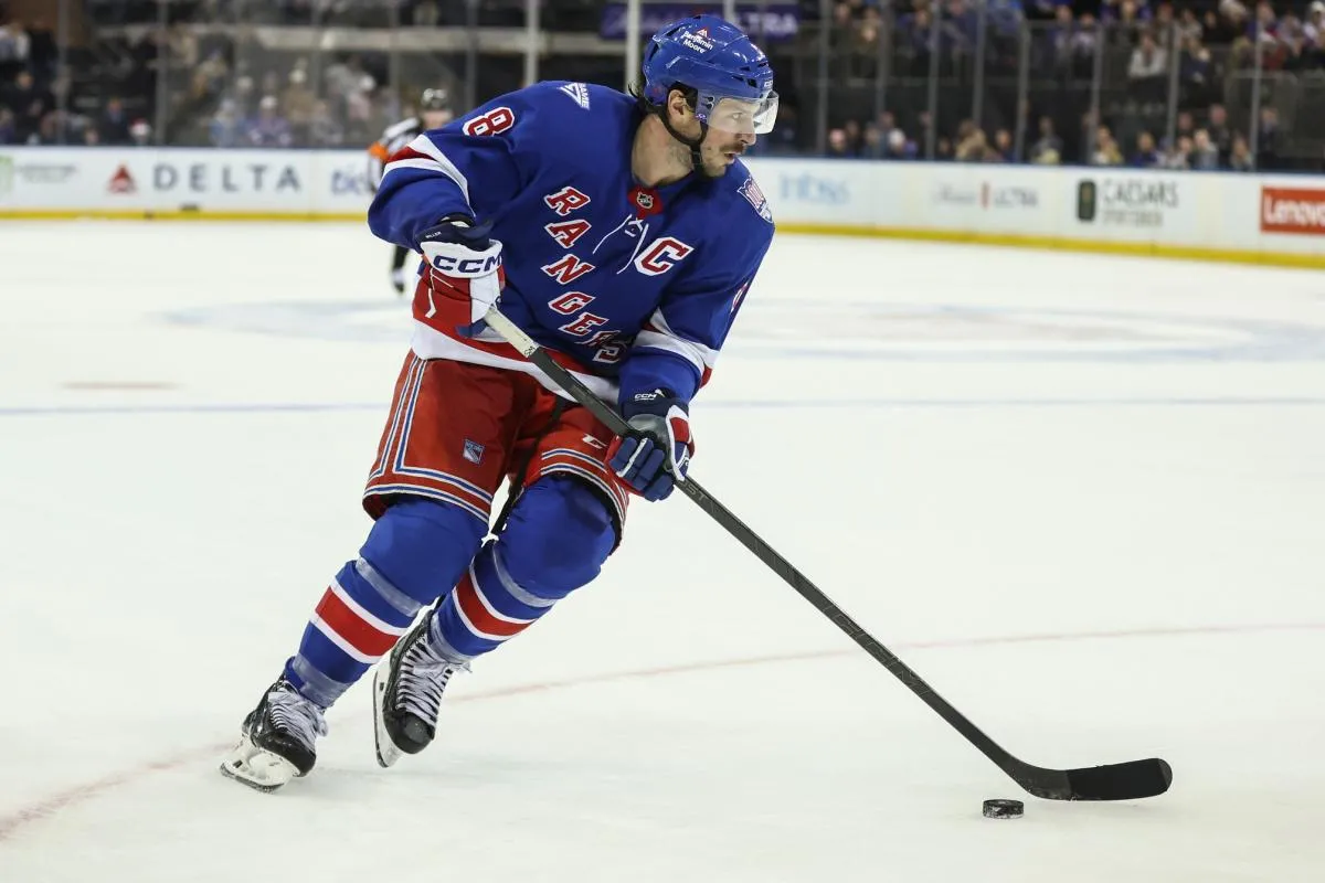 New York Rangers center J.T. Miller (8) controls the puck in overtime against the Colorado Avalanche at Madison Square Garden.