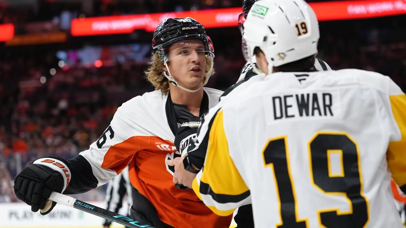 Philadelphia Flyers center Trevor Zegras (46) reacts against Pittsburgh Penguins center Connor Dewar (19) in the third period at Xfinity Mobile Arena.