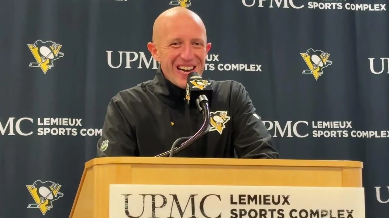 Pittsburgh Penguins head coach Dan Muse smiles while speaking at a presser