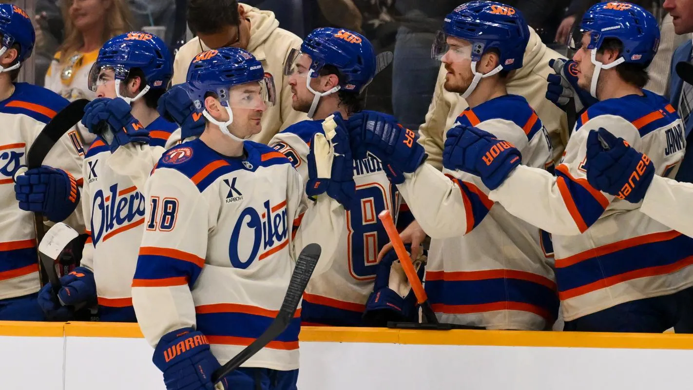 Edmonton Oilers left wing Zach Hyman (18) celebrates with his teammates after scoring a goal against the Nashville Predators during the first period at Bridgestone Arena.