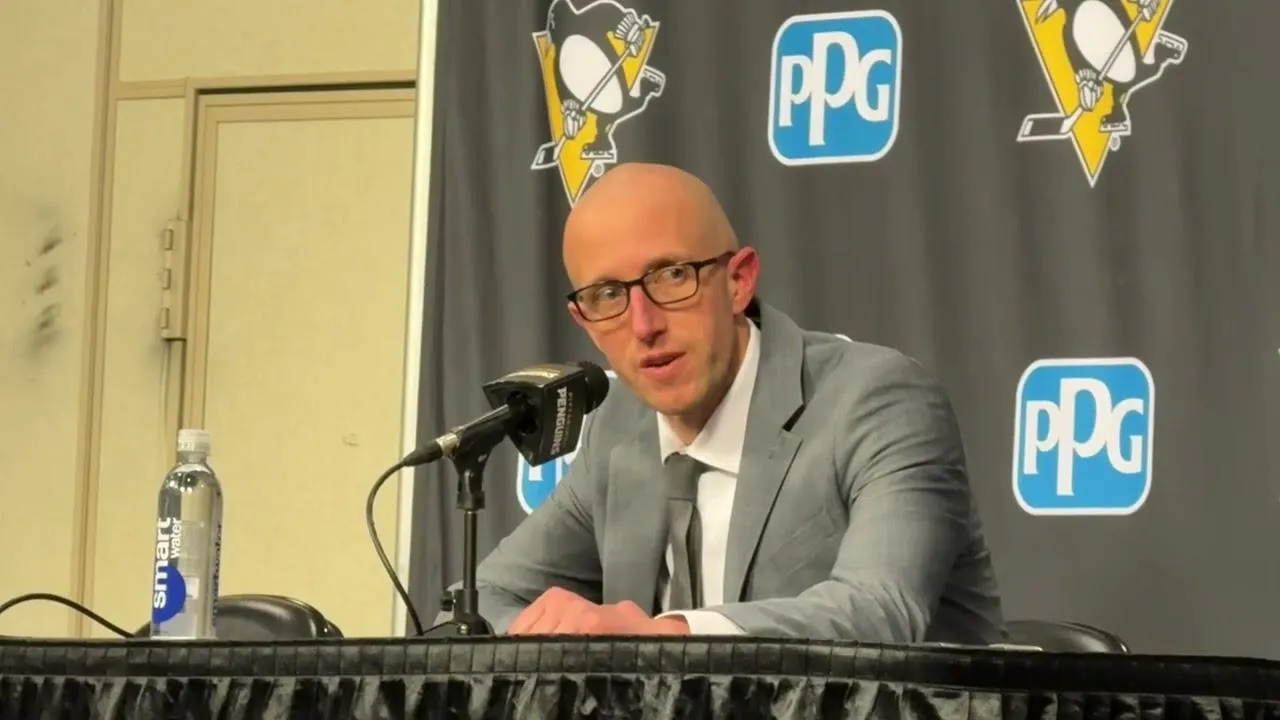 Pittsbugh Penguins Dan Muse sits and speaks to reporters at a presser