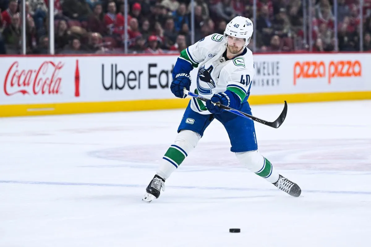 Vancouver Canucks center Elias Pettersson (40) shoots the puck against the Montreal Canadiens during the third period at Bell Centre.