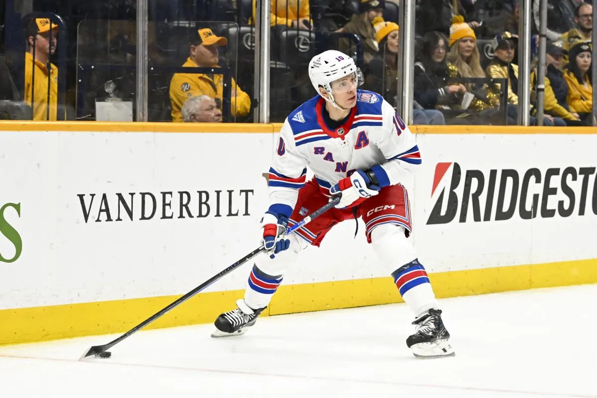 New York Rangers left wing Artemi Panarin (10) skates behind the net against the Nashville Predators during the second period at Bridgestone Arena.