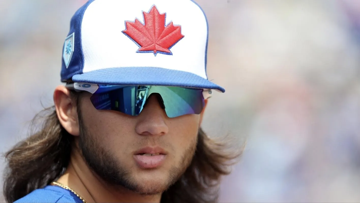 Toronto Blue Jays infielder Bo Bichette (66) looks on from the dugout against the Detroit Tigers at Dunedin Stadium.