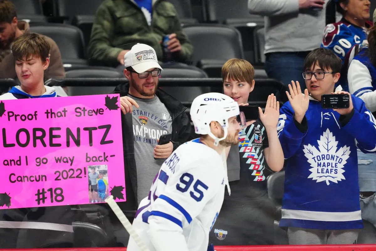 Toronto Maple fans cheer towards defenseman Oliver Ekman-Larsson (95) before the game against the Colorado Avalanche at Ball Arena.