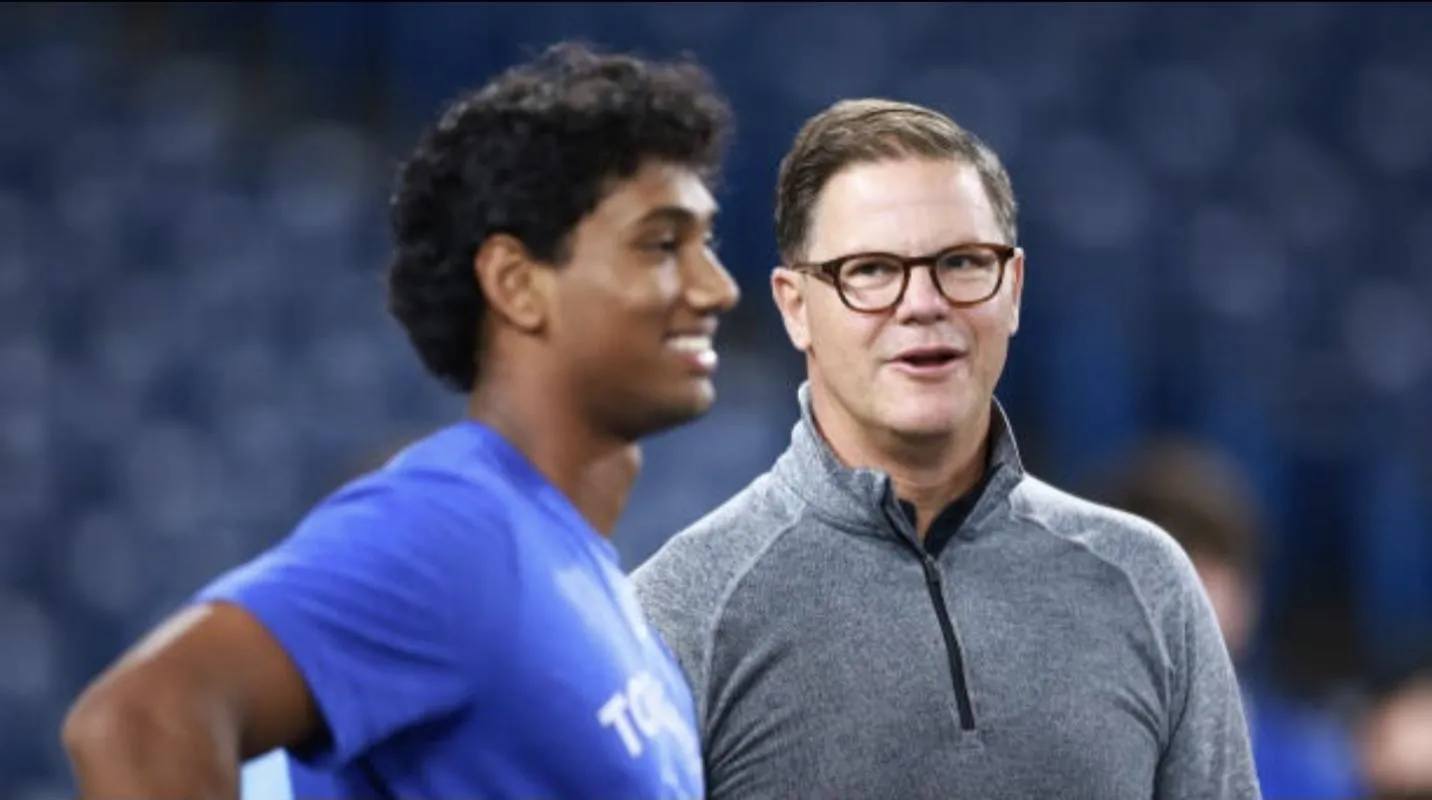 Toronto Blue Jays top prospect Arjun Nimmala on the field conversing with general manager Ross Atkins at Rogers Centre in Toronto Ontario, Canada.
