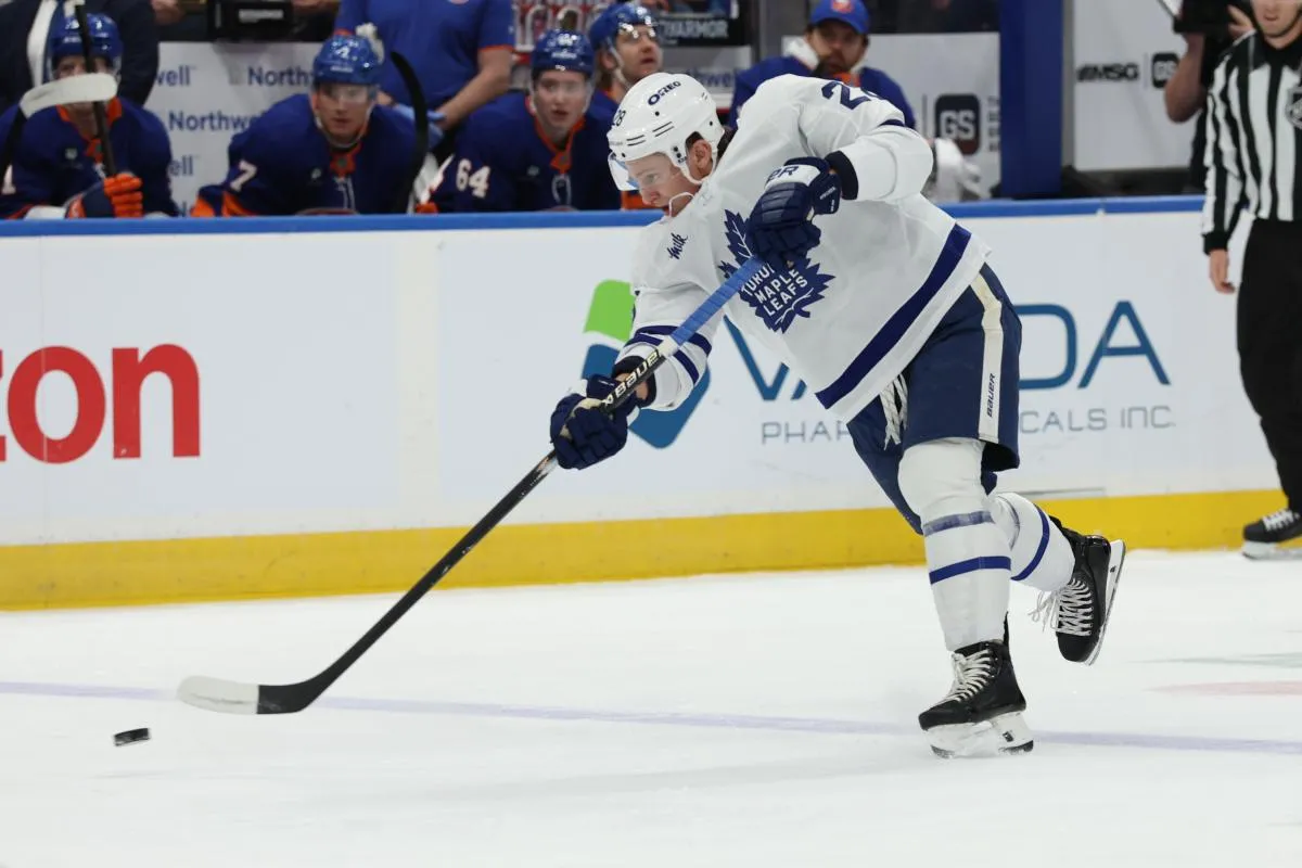 Toronto Maple Leafs defenseman Troy Stecher (28) take a shot against the New York Islanders during the first period at UBS Arena.