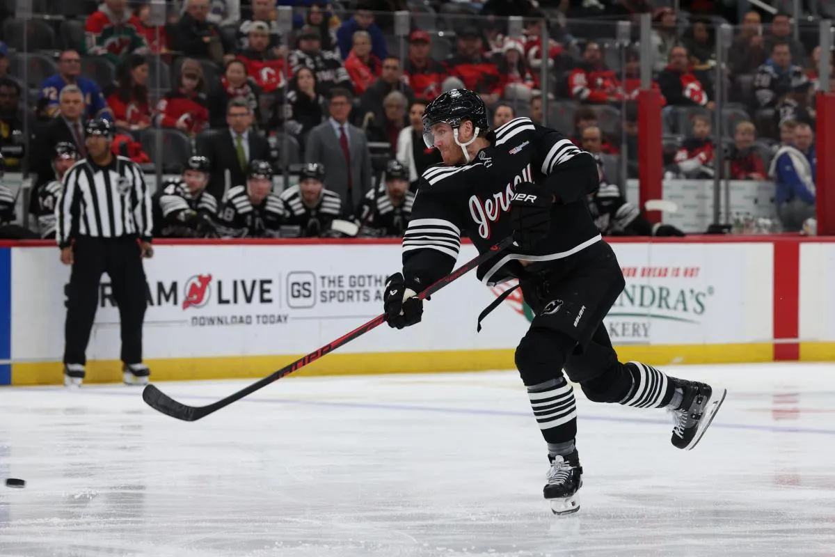 New Jersey Devils defenseman Dougie Hamilton (7) takes a shot against the Buffalo Sabres during the second period at Prudential Center.
