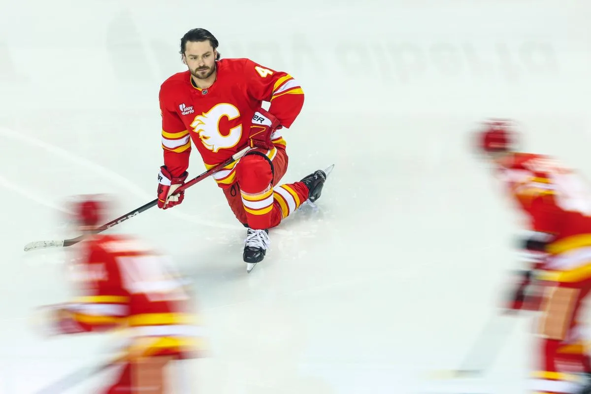 Calgary Flames defenseman Rasmus Andersson (4) during the warmup period against the New York Islanders at Scotiabank Saddledome.