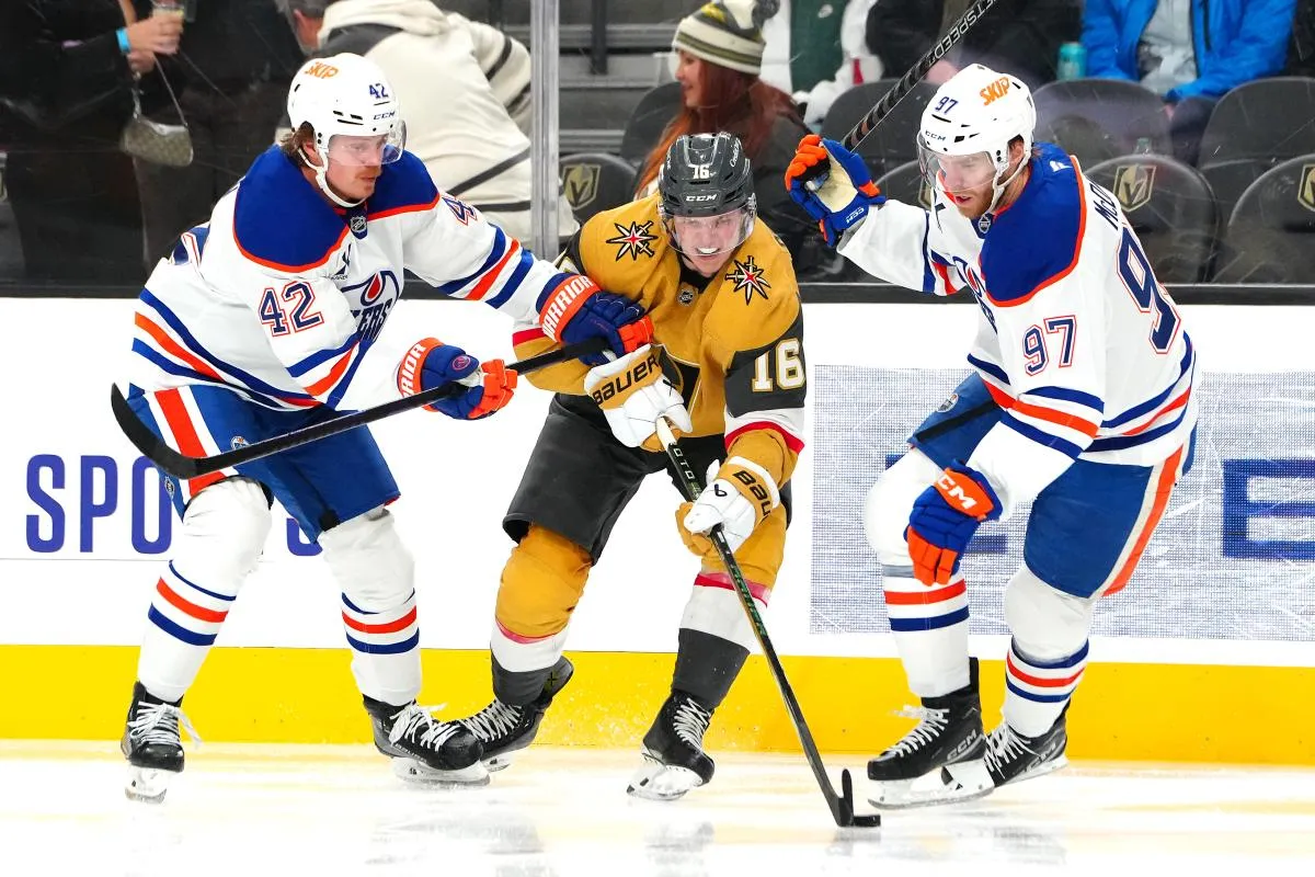 Vegas Golden Knights left wing Pavel Dorofeyev (16) skates between Edmonton Oilers right wing Kasperi Kapanen (42) and Edmonton Oilers center Connor McDavid (97) during the second period at T-Mobile Arena.