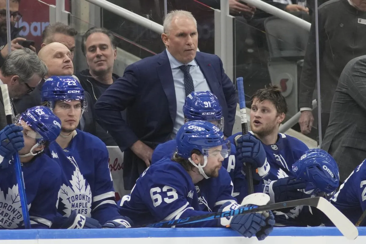 Toronto Maple Leafs head coach Craig Berube looks on from the bench during the third period against the Minnesota Wild at Scotiabank Arena.