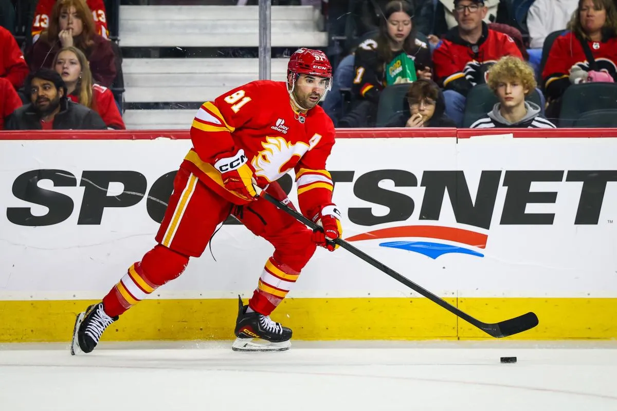Calgary Flames center Nazem Kadri (91) controls the puck against the New Jersey Devils during the second period at Scotiabank Saddledome.