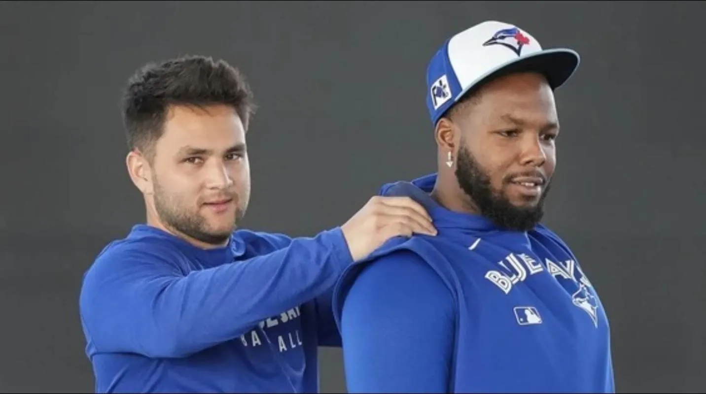 Toronto Blue Jays shortstop Bo Bichette (11) and first baseman Vladimir Guerrero Jr. (27)horsing around during photo shoot.