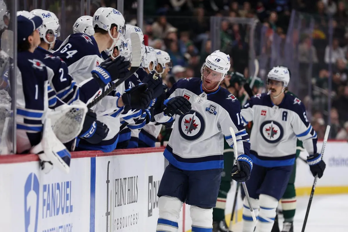 Winnipeg Jets center Jonathan Toews (19) celebrates his goal against the Minnesota Wild during the first period at Grand Casino Arena.