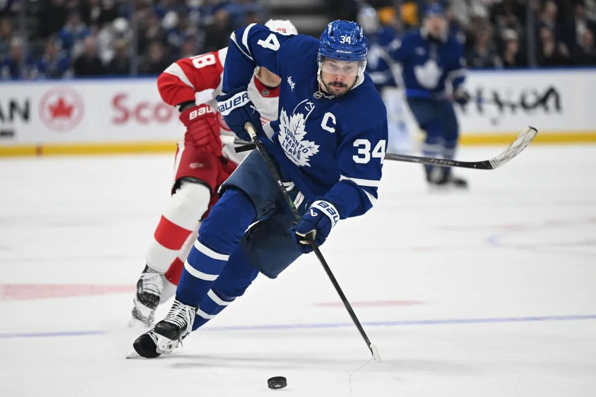 Toronto Maple Leafs forward Auston Matthews (34) pursues the puck against the Detroit Red Wings in the third period at Scotiabank Arena.