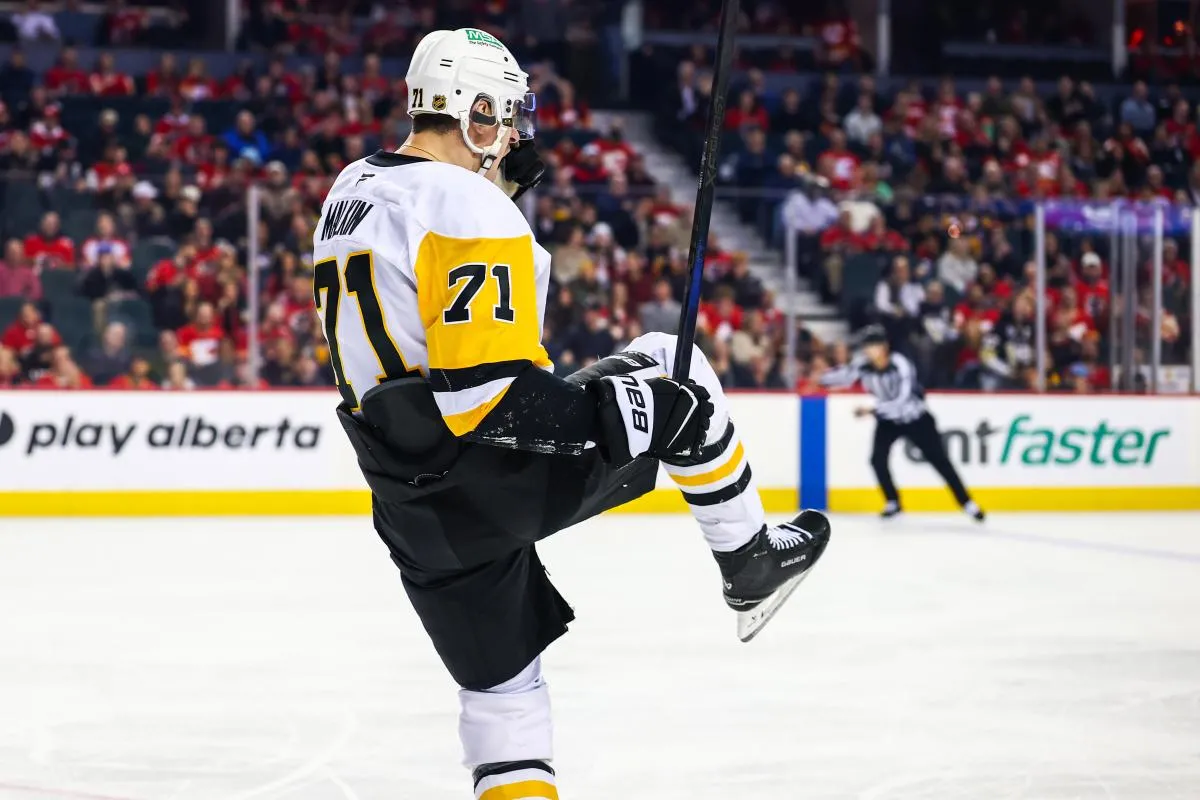 Pittsburgh Penguins center Evgeni Malkin (71) celebrates his goal against the Calgary Flames during the first period at Scotiabank Saddledome.
