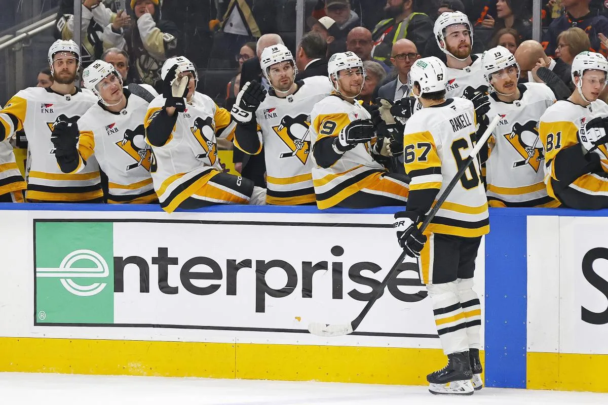 The Pittsburgh Penguins celebrate a goal scored by forward Rickard Rakell (67) during the second period against the Edmonton Oilers at Rogers Place.