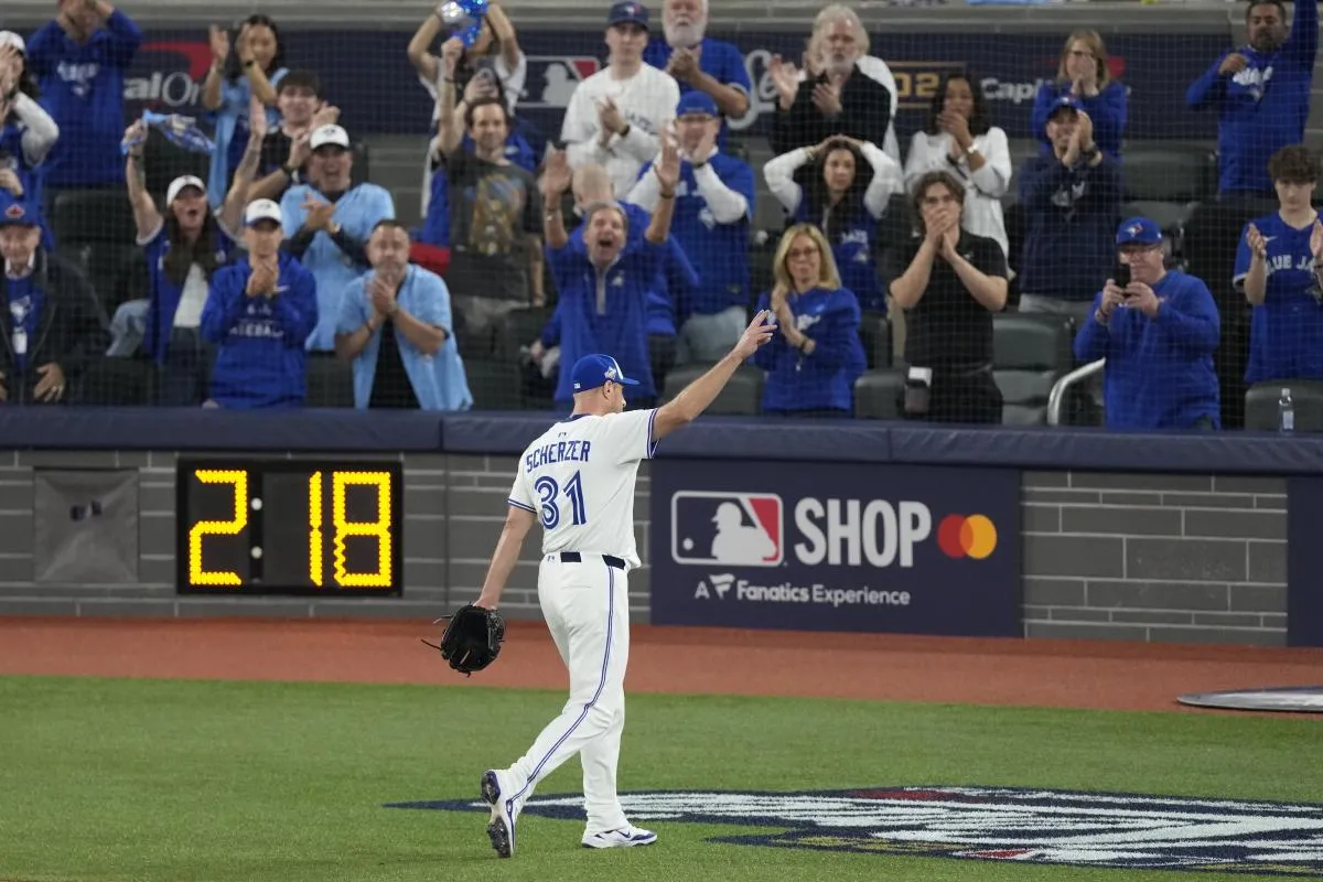 Toronto Blue Jays pitcher Max Scherzer (31) is relieved in the fifth inning against the Los Angeles Dodgers during game seven of the 2025 MLB World Series at Rogers Centre.