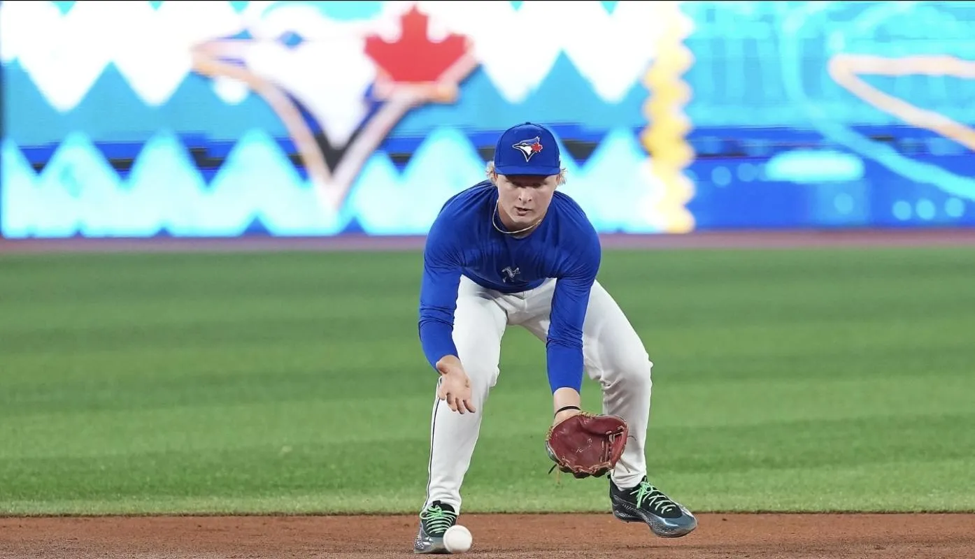 Toronto Blue Jays first round draft pick JoJo Parker fields balls during practice before a game against the Baltimore Orioles at Rogers Centre.