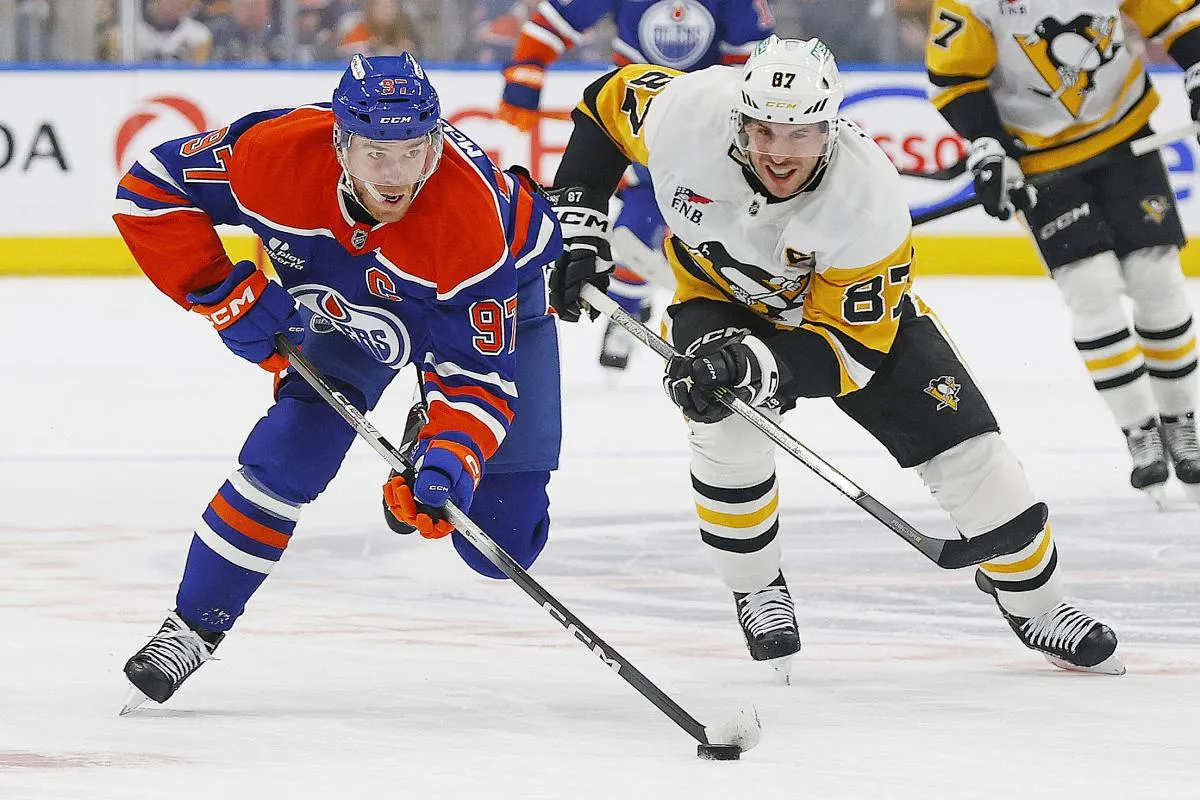 Pittsburgh Penguins forward Sidney Crosby (87) chases Edmonton Oilers forward Connor McDavid (97) up the ice during the first period at Rogers Place.