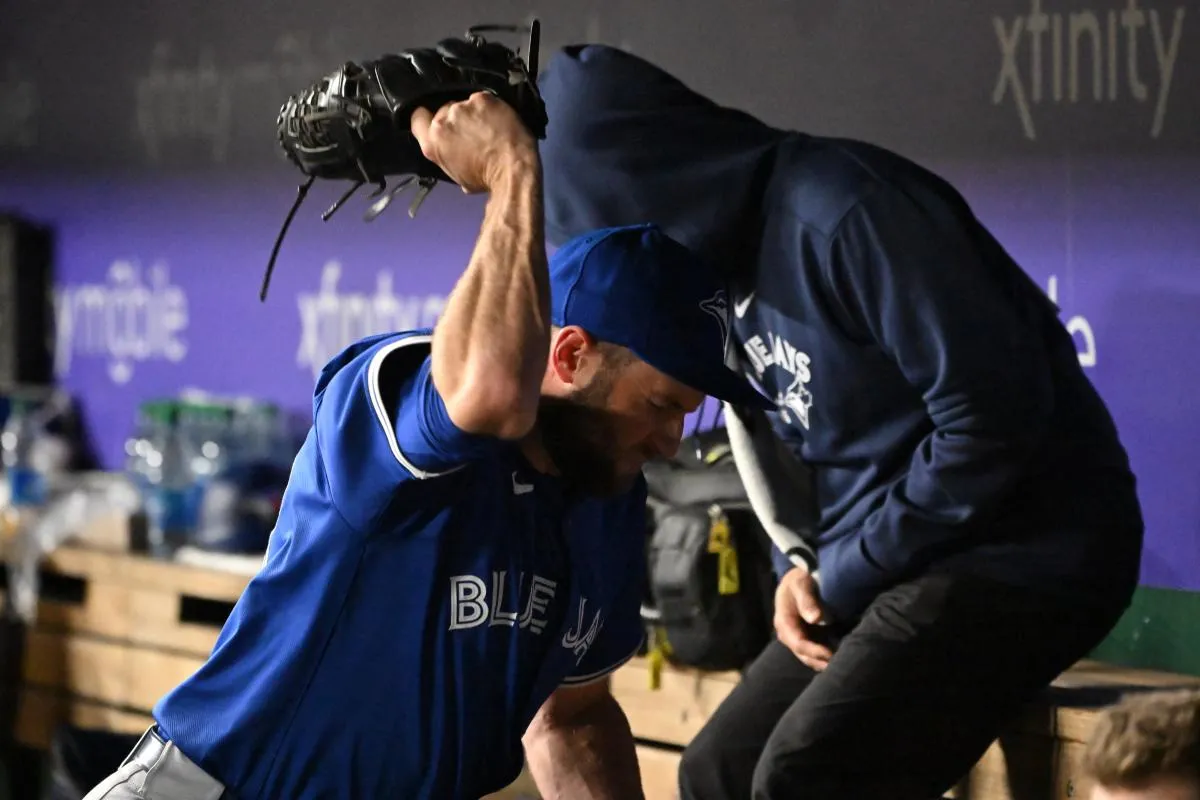 Toronto Blue Jays relief pitcher Tim Mayza (58) reacts in the dugout after giving up 2 runs against the Washington Nationals during the seventh inning at Nationals Park.