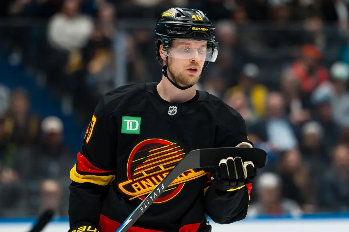 Vancouver Canucks forward Elias Pettersson (40) checks his stick during a stop in play against the Washington Capitals in the second period at Rogers Arena.