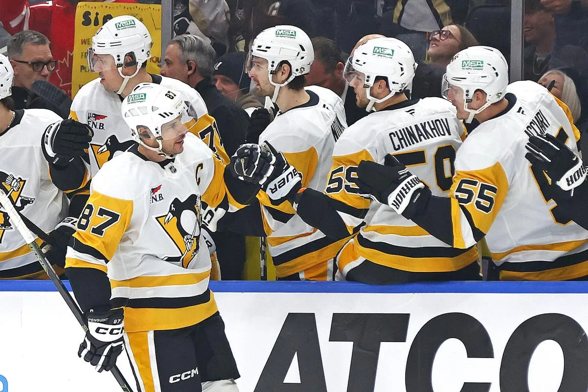 The Pittsburgh Penguins celebrate a goal scored by forward Sidney Crosby (87) during the first period against the Edmonton Oilers at Rogers Place.