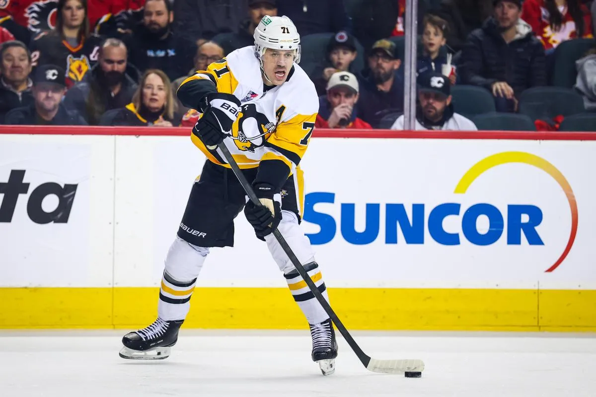 Pittsburgh Penguins center Evgeni Malkin (71) controls the puck against the Calgary Flames during the first period at Scotiabank Saddledome.