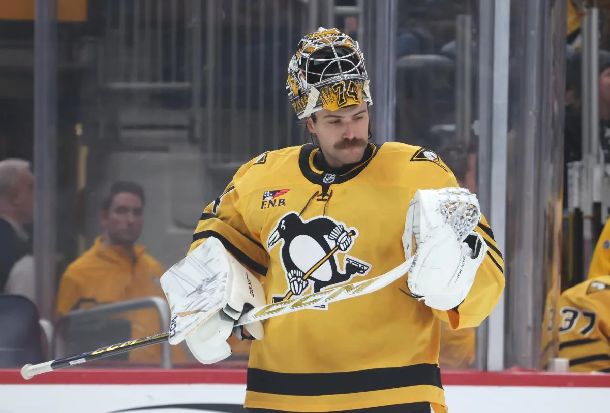 Pittsburgh Penguins goaltender Stuart Skinner (74) returns to his net against the Philadelphia Flyers during the first period at PPG Paints Arena.